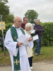 The congregation walked around the village as the service took place. 